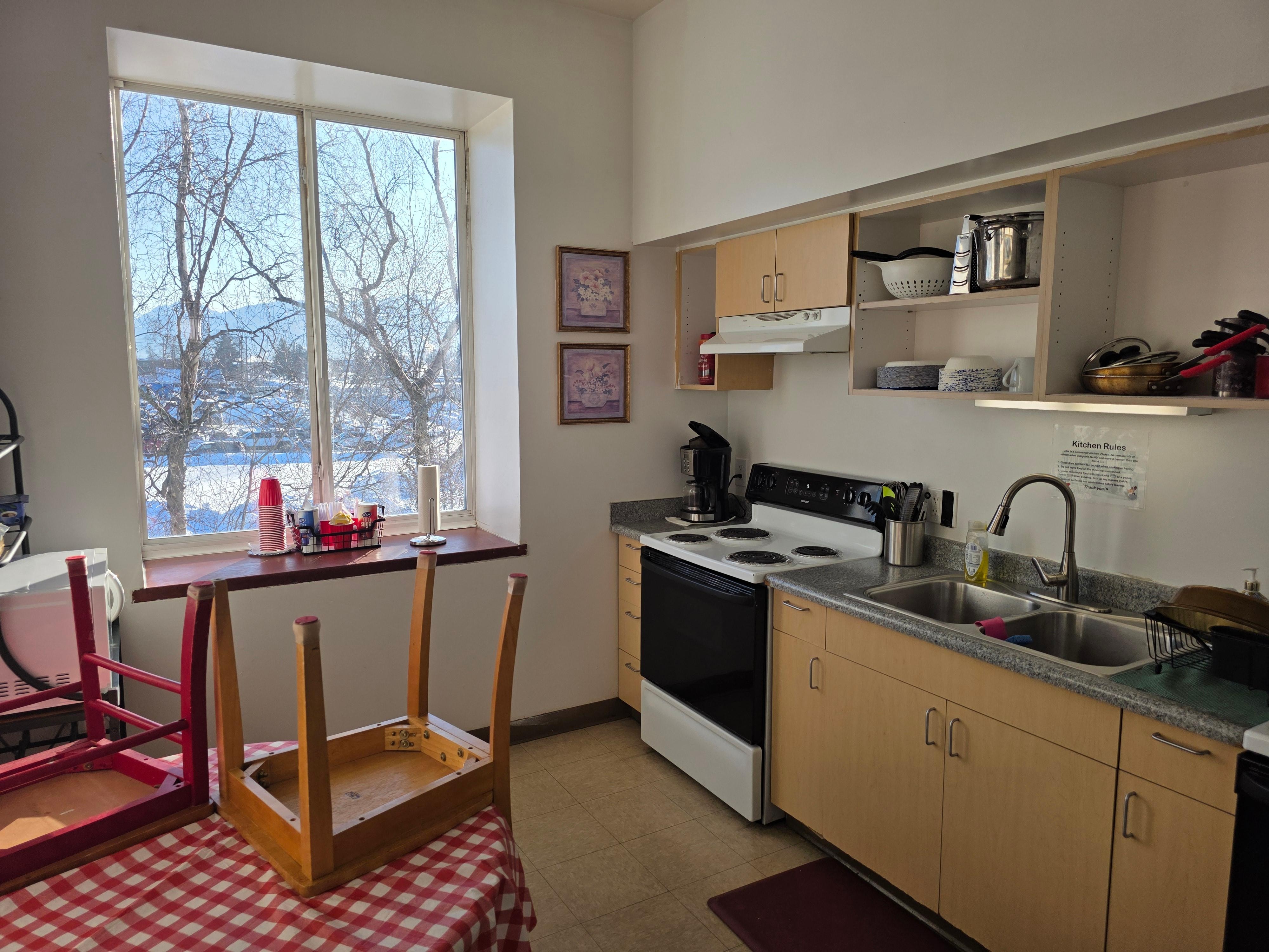 Shared kitchen with stove and oven, microwave. Refrig in room.