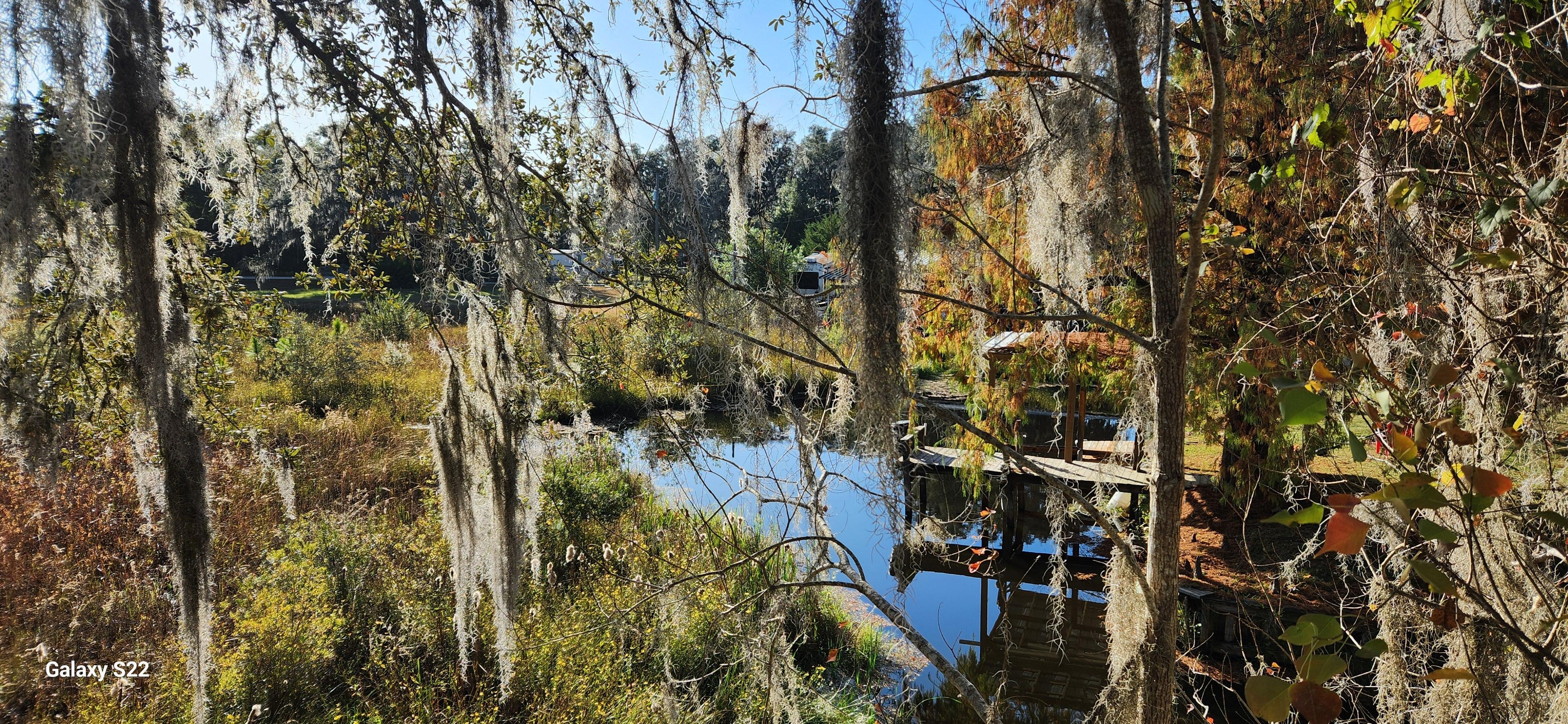 From the outside deck to small lake in back