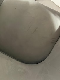 DINGY DESK CHAIR. (DID NOT SIT IN IT) DRAWS WERE DIRTY W/ITEMS INSIDE