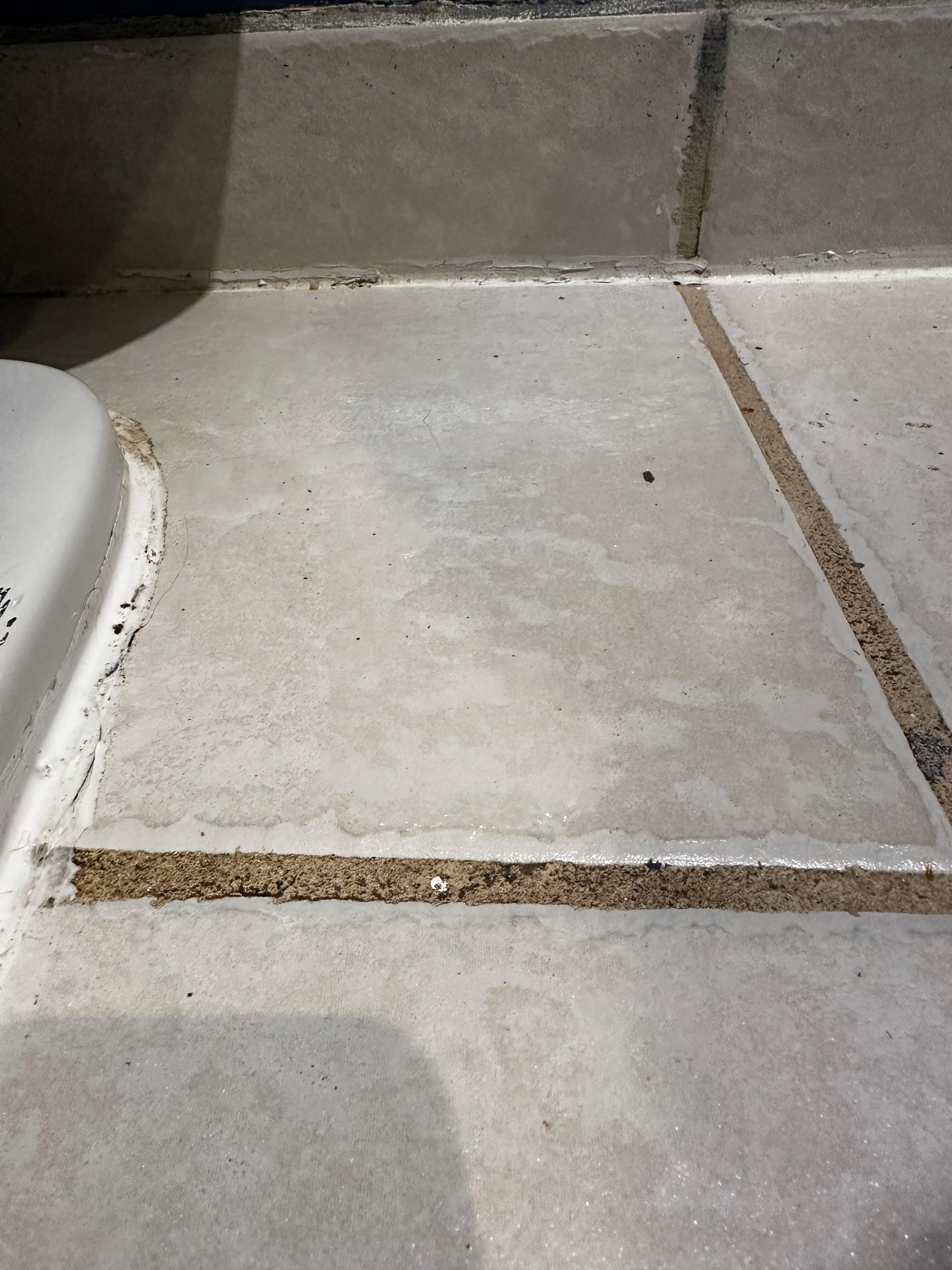 Very old toilet leaked water from pipe or condensation. Floor always wet.