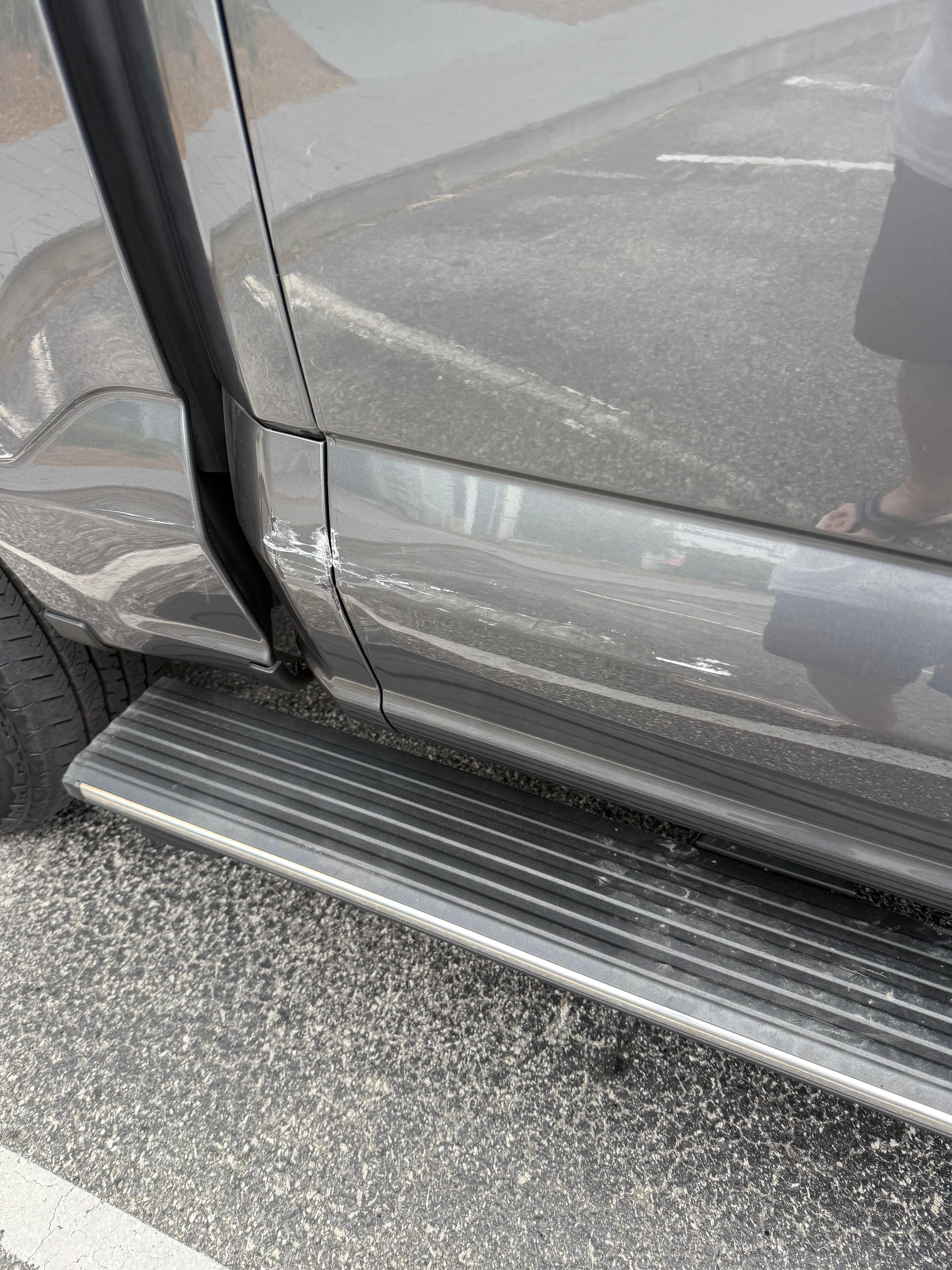 Large long deep scratch and dented