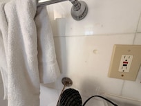 Cracked tiles in bathroom