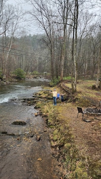 The view from the cabin deck and where my Husband and boys caught trout.