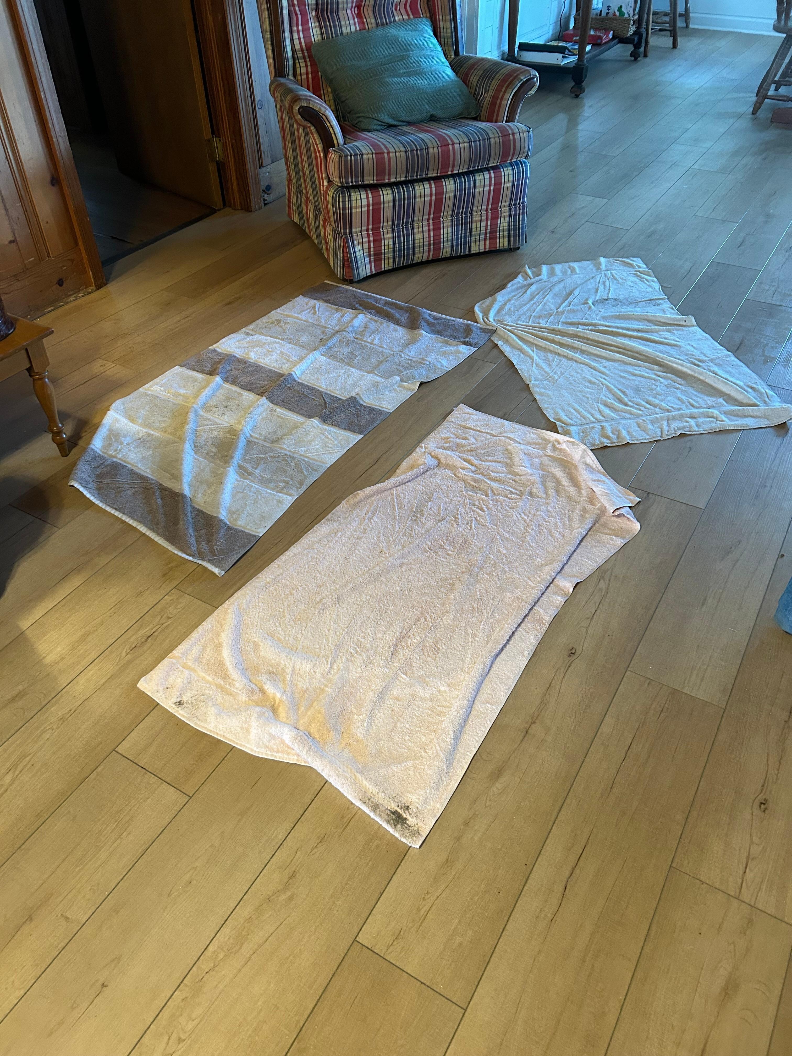 Towels to soak up water from roof. Water from AC unit.