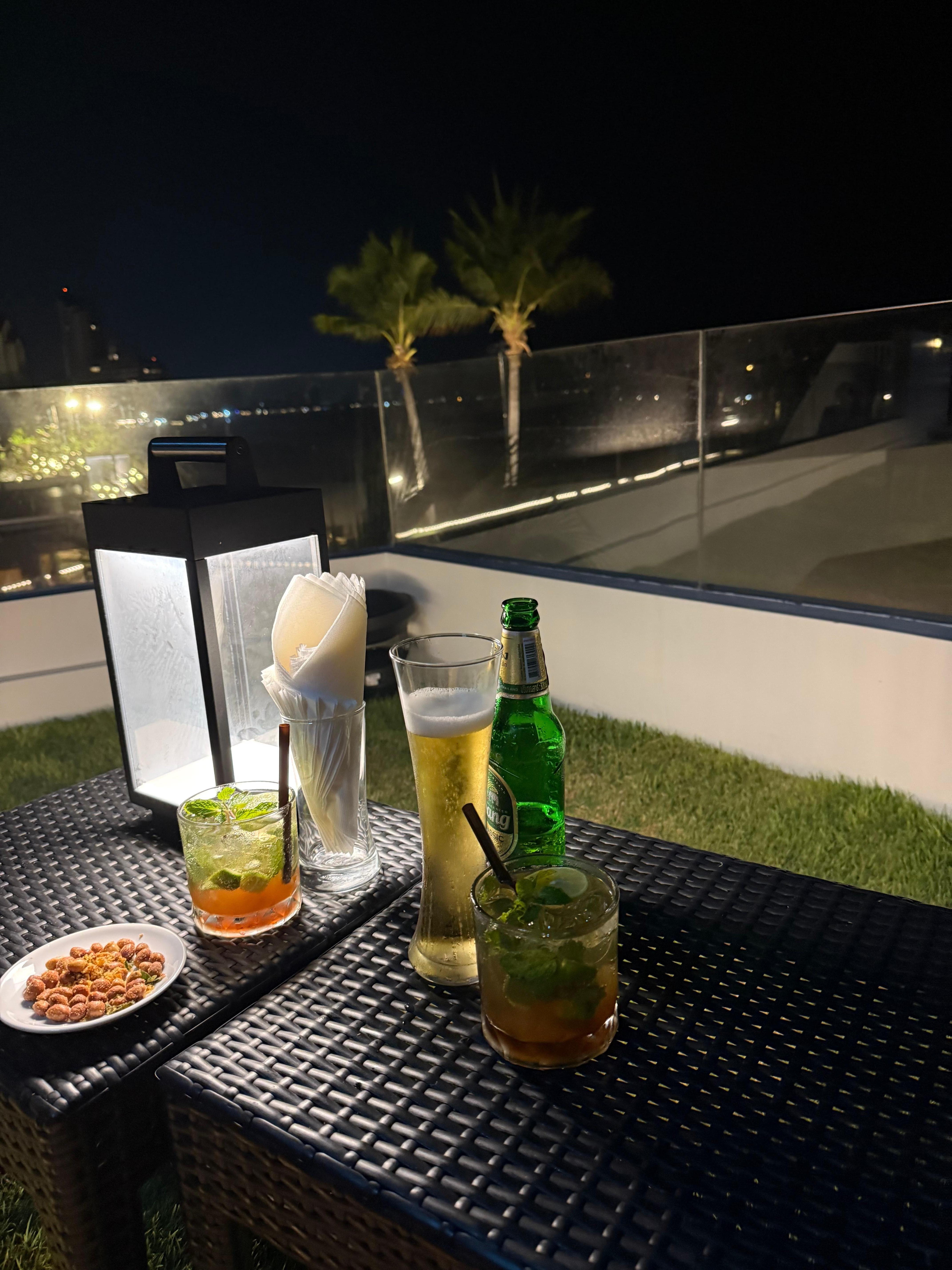 Rooftop drinks overlooking  the beach 