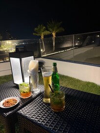 Rooftop drinks overlooking the beach