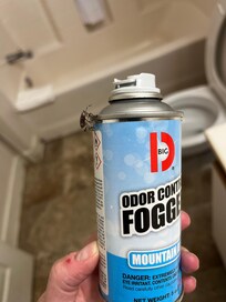 stink bug on the side of the Odor Control Fogger can found beside my bed.