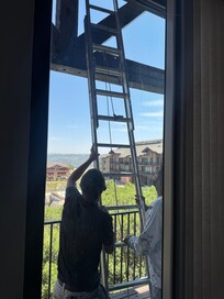 Workers on the balcony