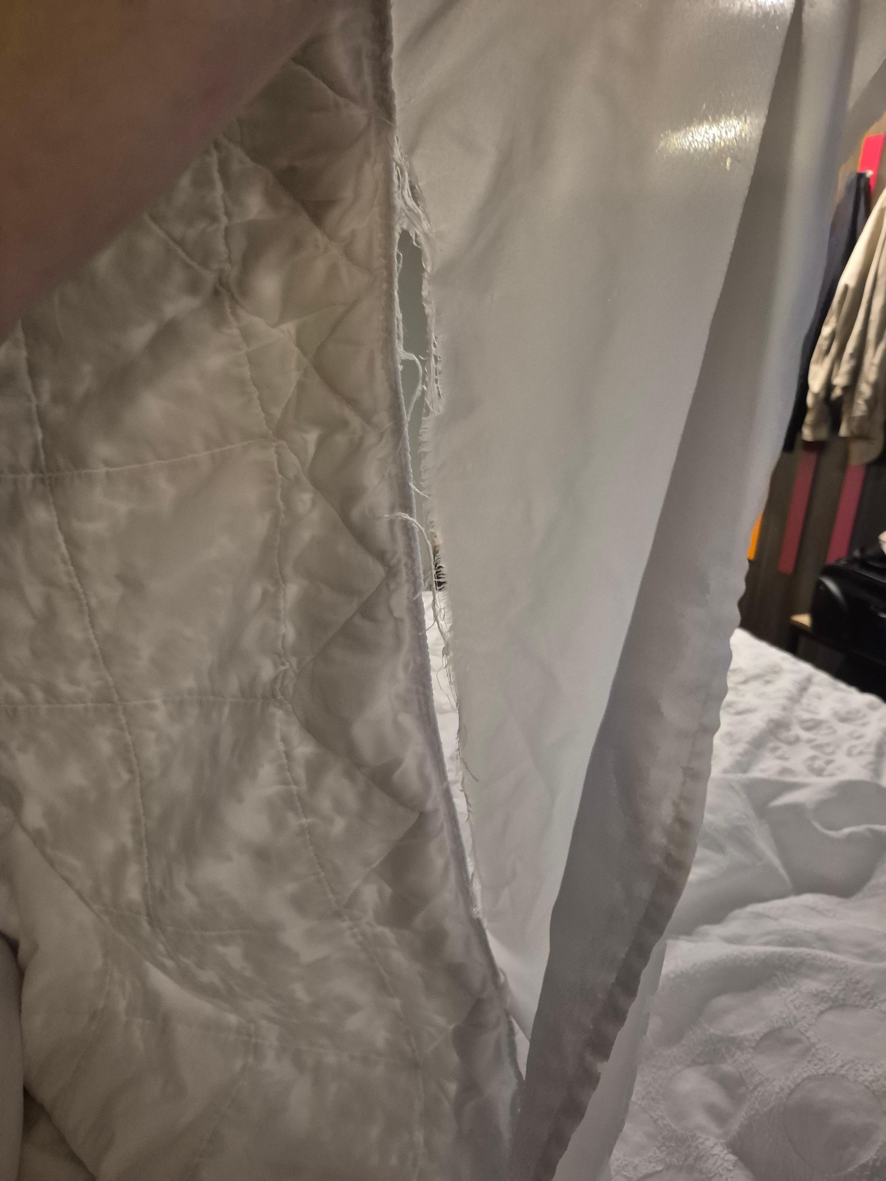 Big hole in bed cover