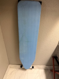 Stained and very dirty ironing board