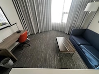 Sitting area with desk and great view.