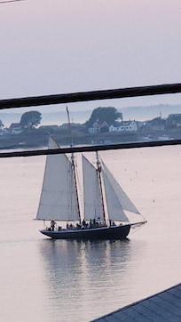 Ship sailed up bay in front of rental in evening. Fired "cannon salute to sunset" in front of house. First time was a surprise.
