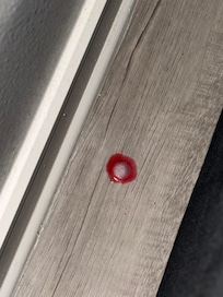 Dirty spot in between couch and wall