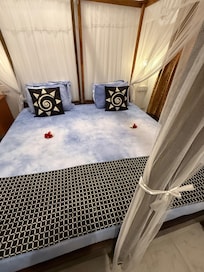 The elegant and comfortable four poster bed