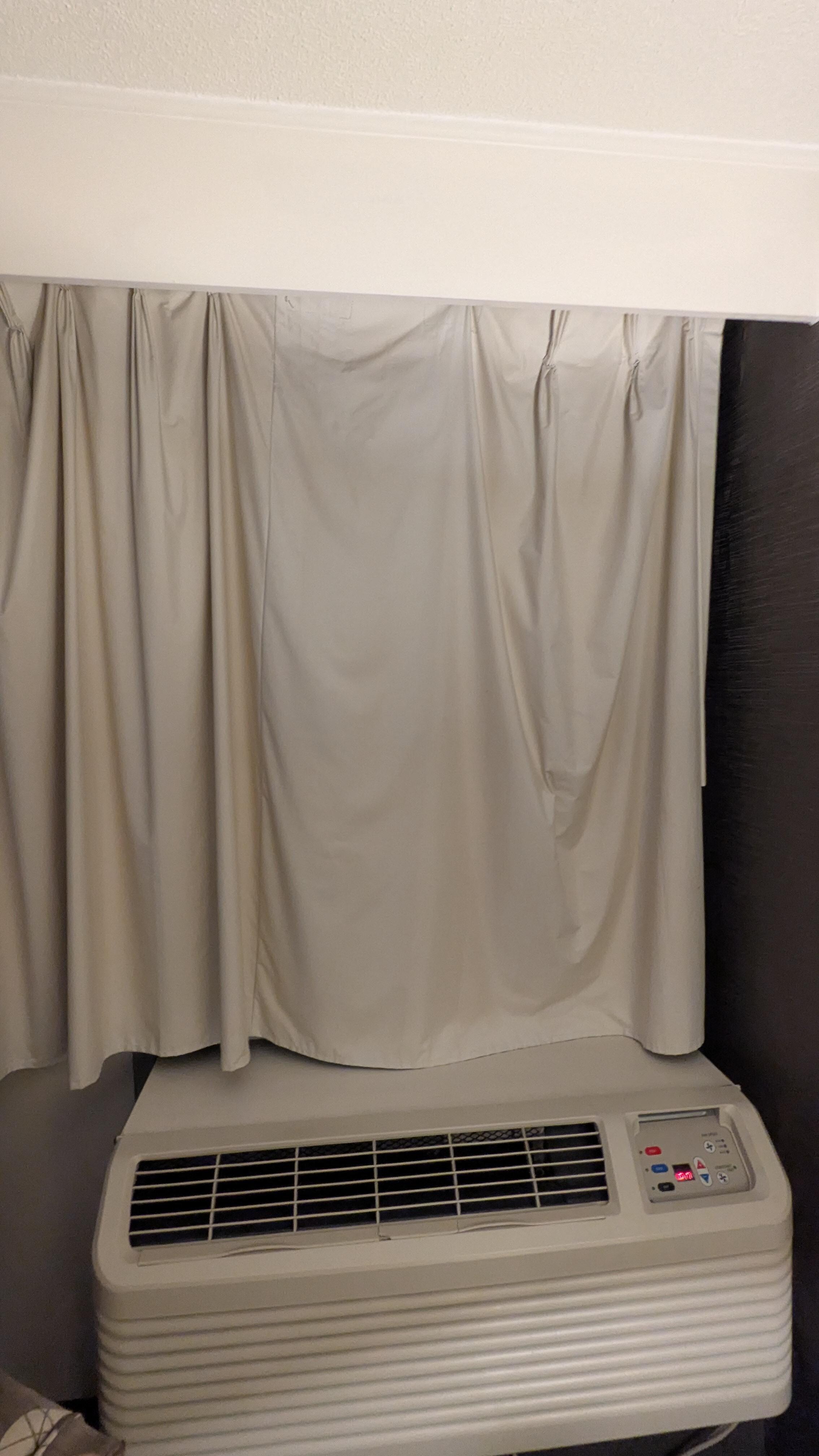 Old curtain not properly hung, which allowed for the sun to blast us in the face in the morning. We have to affix it to the curtain rod! 