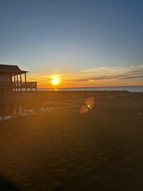 Front row seating to the sun rising over the ocean.