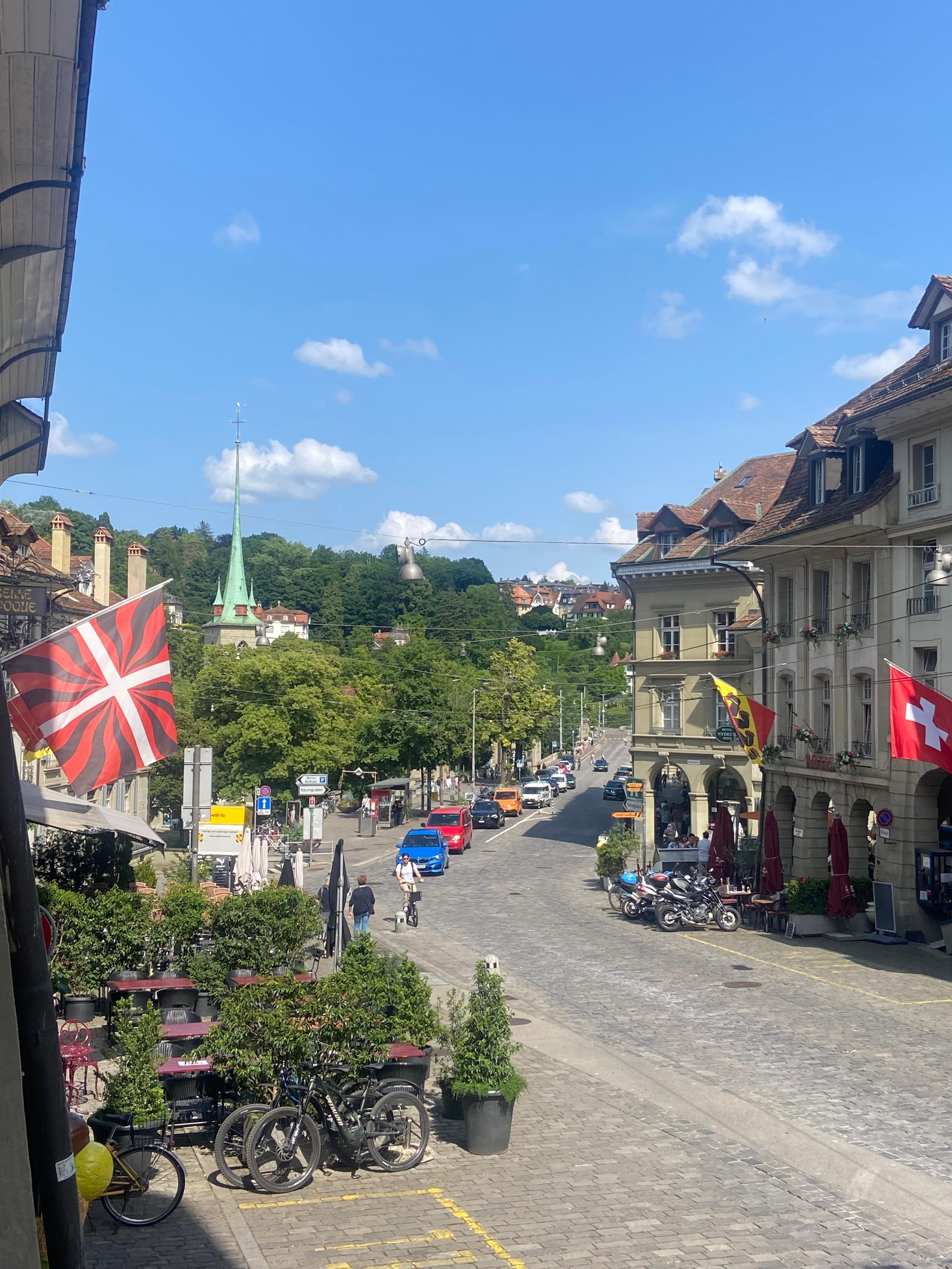 View down the street towards the bridge from outside hotel