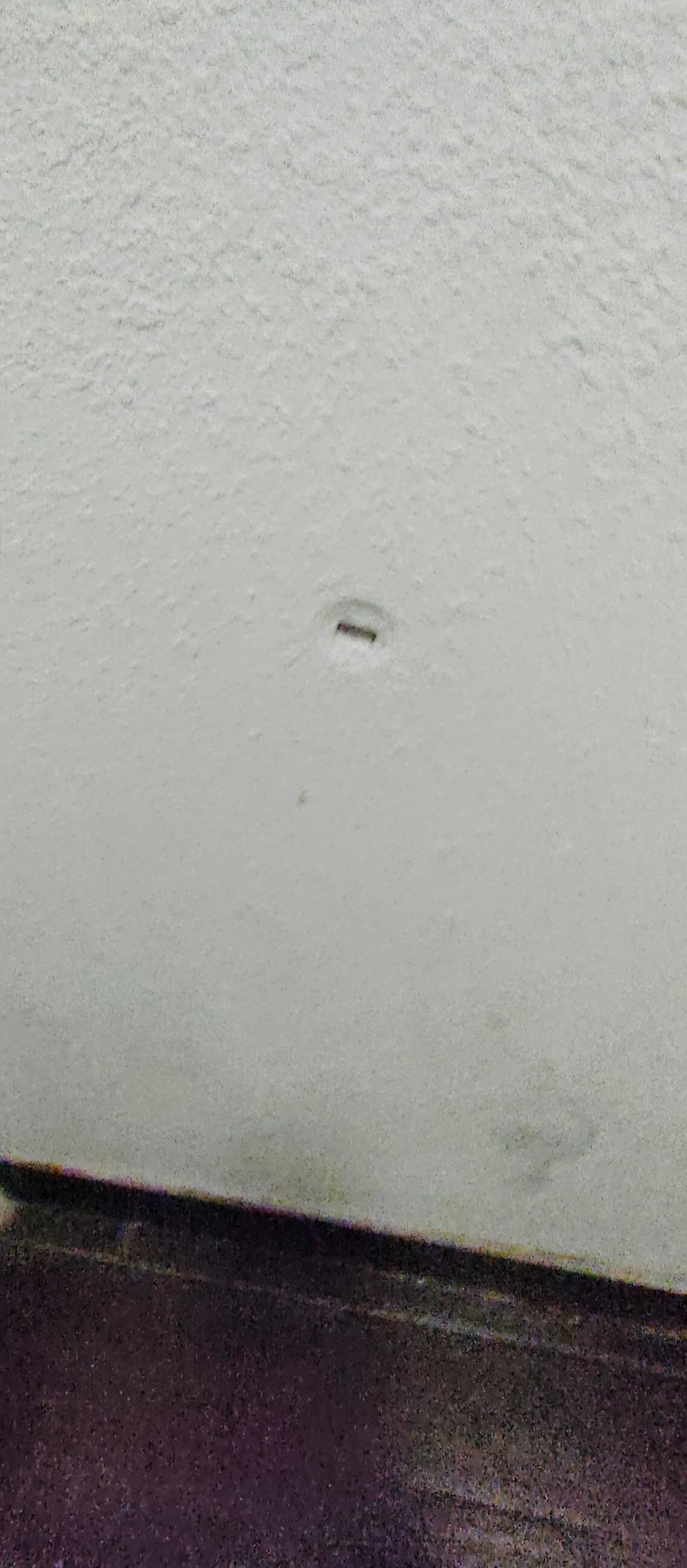 Hole in the wall from other tenants. Was there before we arrived.