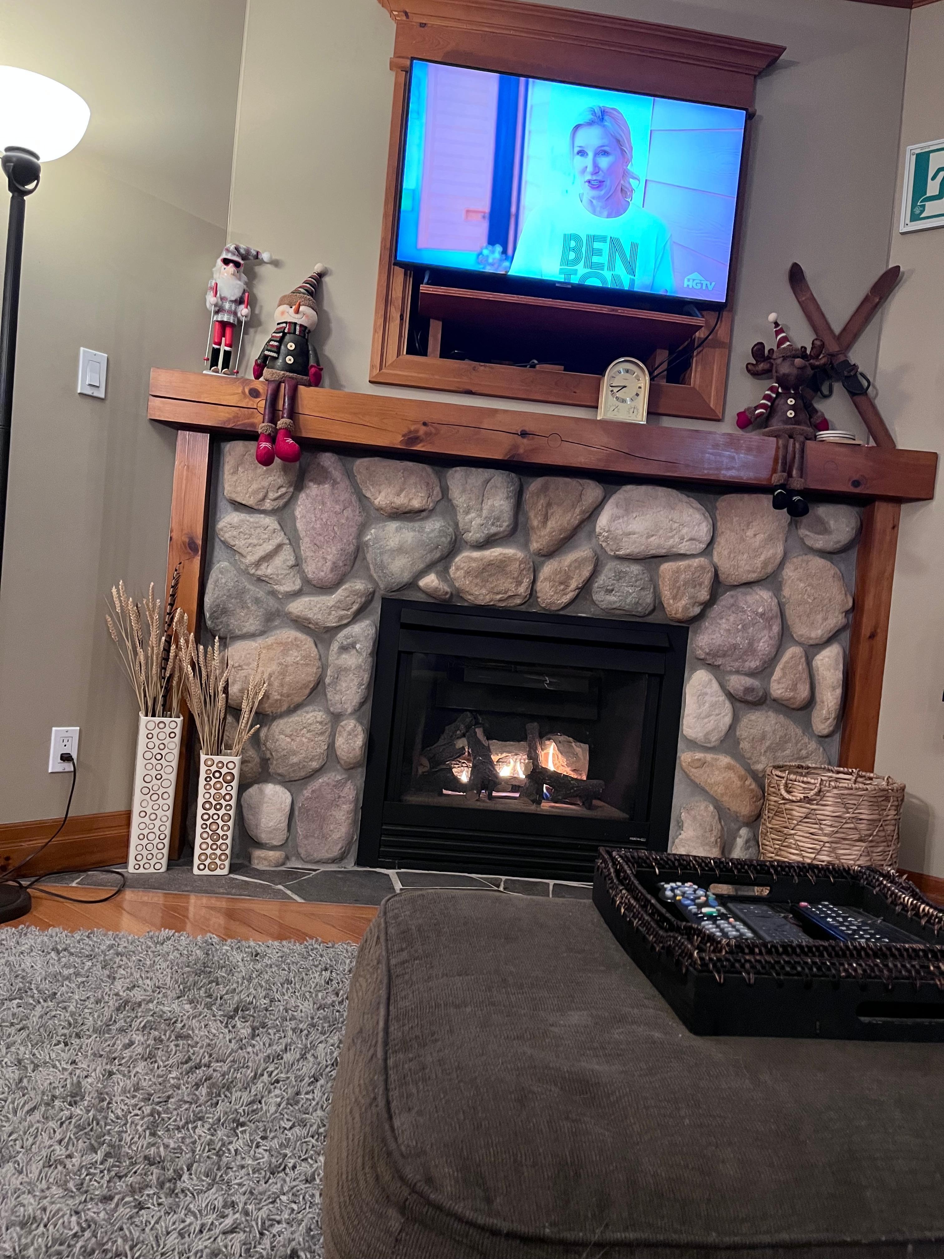 Enjoyed watching tv in front of the fire on cozy furniture