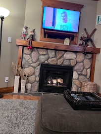 Enjoyed watching tv in front of the fire on cozy furniture