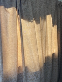 This was the blackout curtain in my room. Someone had ripped a section of it out so that the sun - when it came up at 4:30am was illuminating the room.