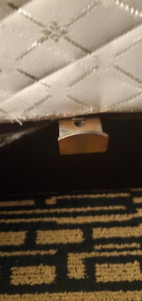 This piece of metal was sticking out from underneath the box spring of the bed. I did'nt notice it until I hit the back of my leg on it very hard getting out of bed this morning. My leg was swollen and throbbing throughout most of the day.