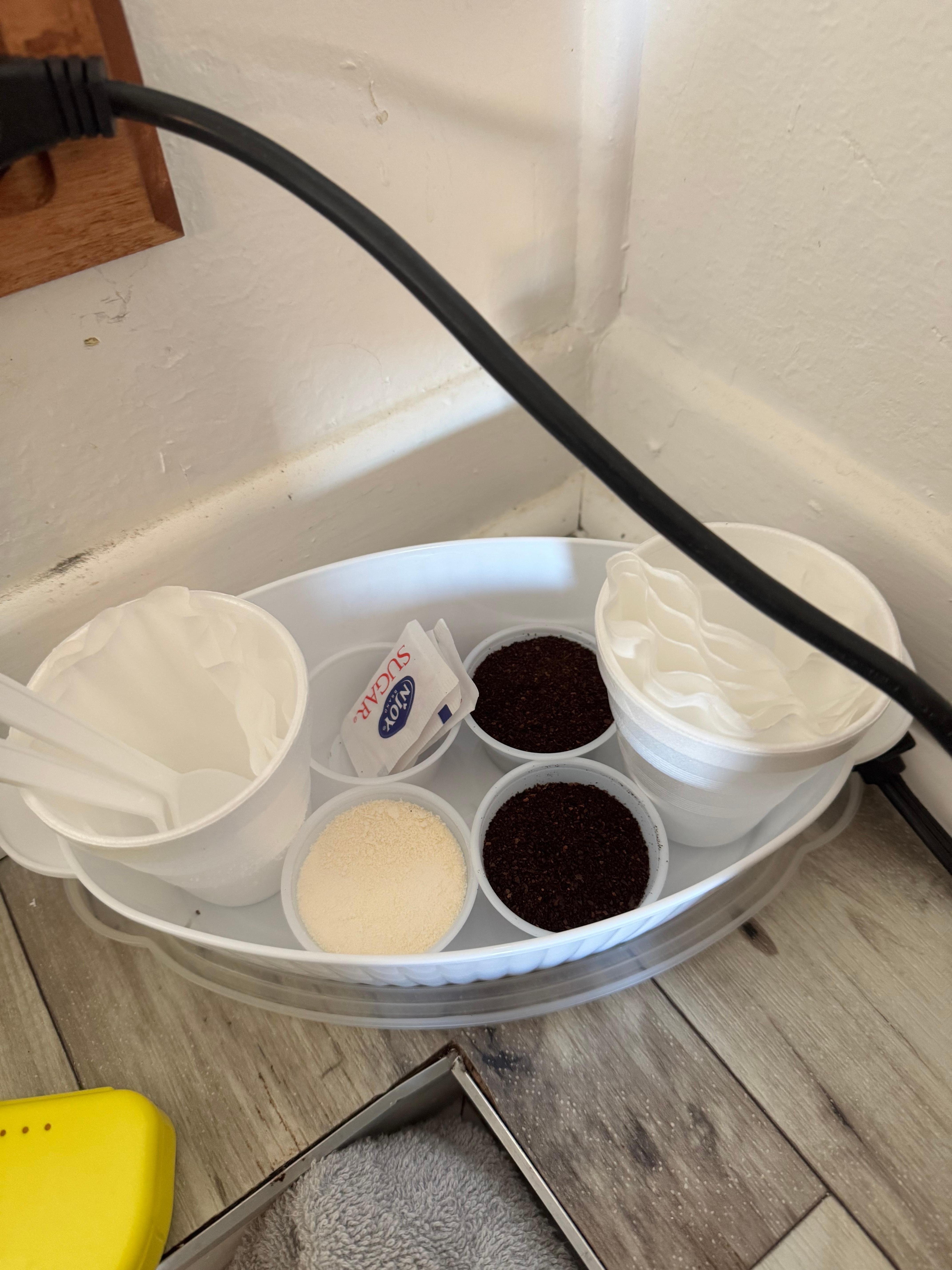 Coffee and creamer left out uncovered 