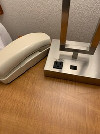 Outdated phone with no cord (sorry didn't get the whole pic)