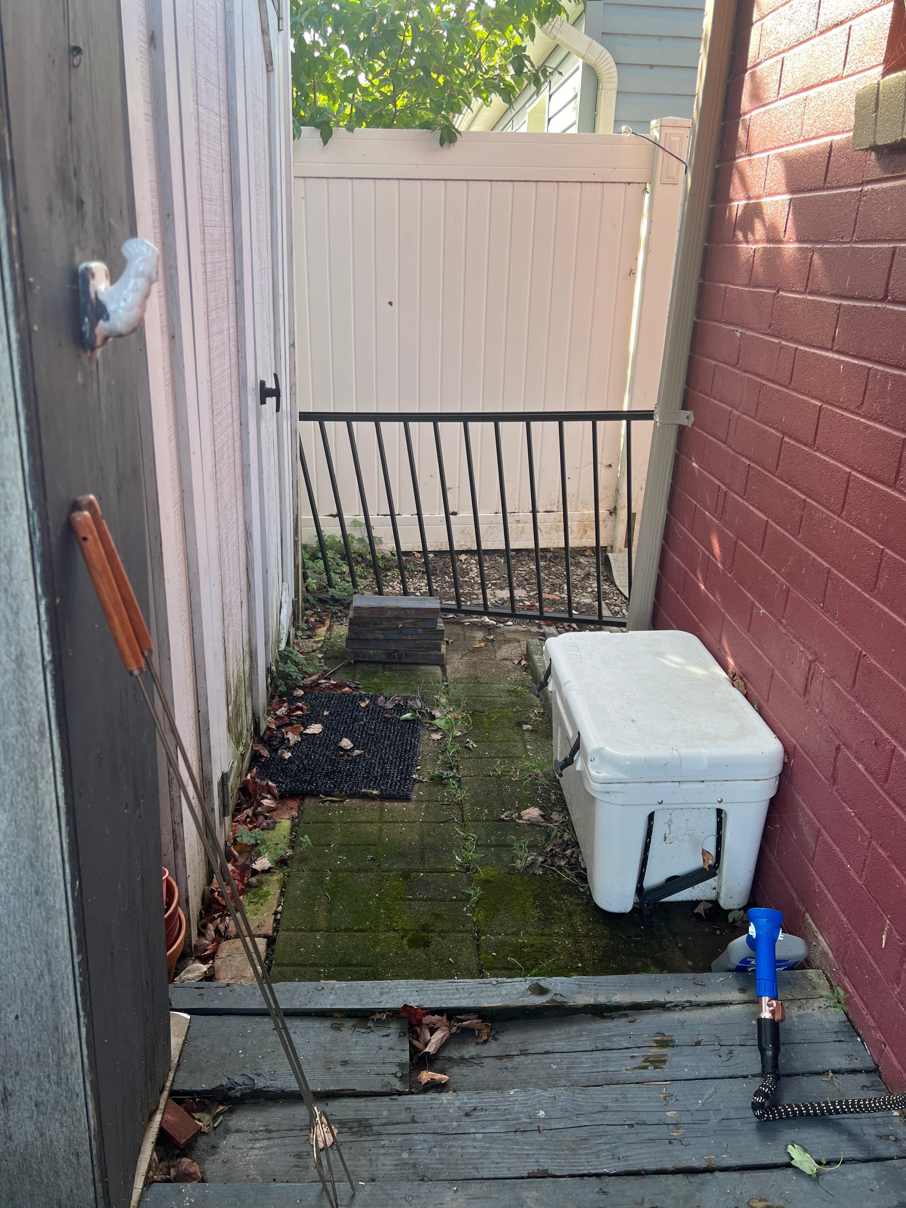 Obvious rotted wood with a hole in the deck.