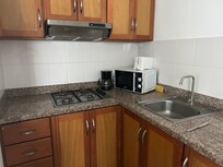 Old appliances, too dirty to even use. 1 cup, a few crappy knives and spoons