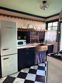 Retro kitchen with Swiss Madison sink and classic appliances