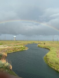 Rainbow and view from our front deck.