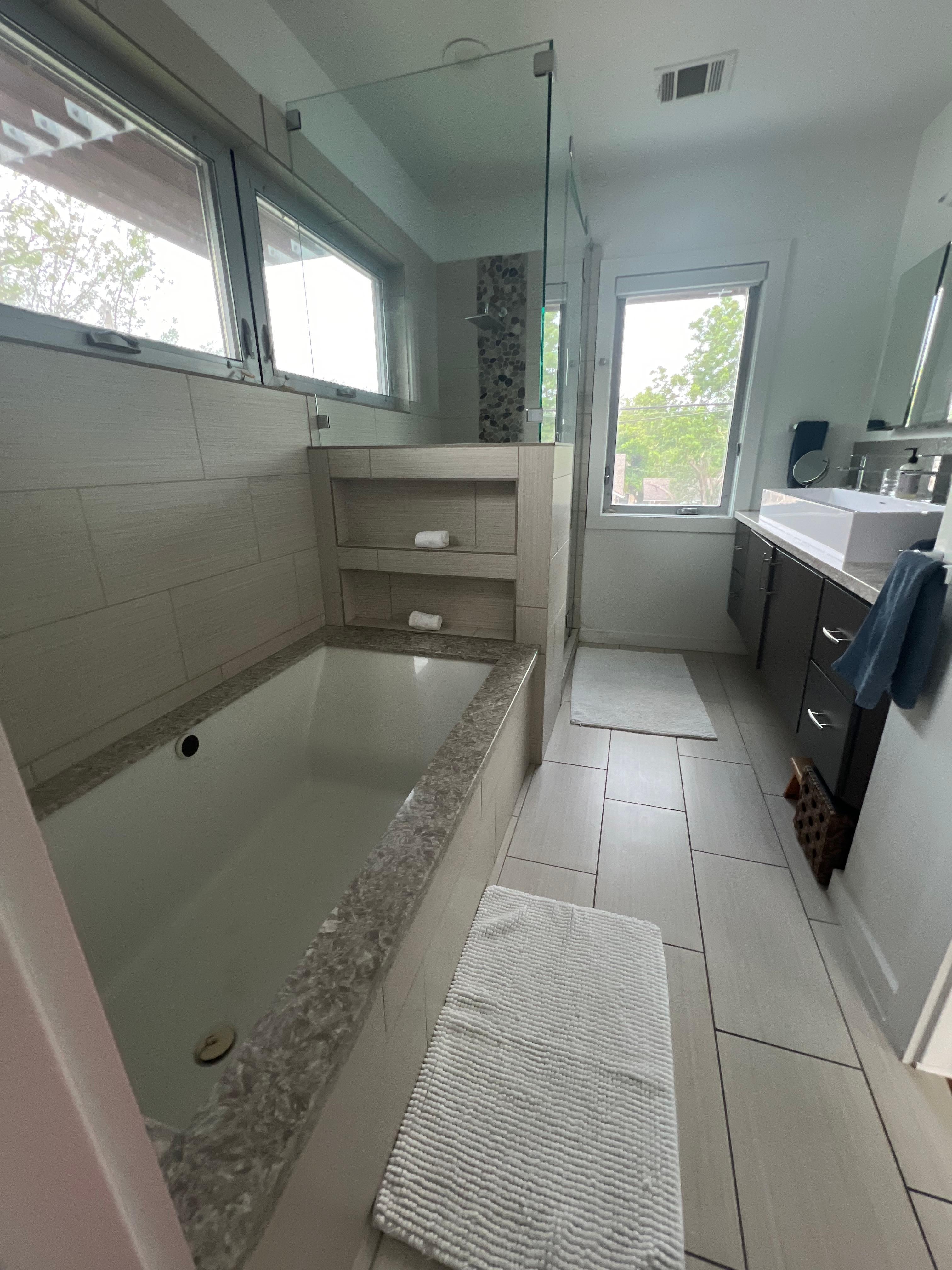 Beautiful hand- crafted glass fixture above stairs 