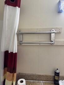 Somebody just came up with a two pieces of wood on the wall to hold this thing up