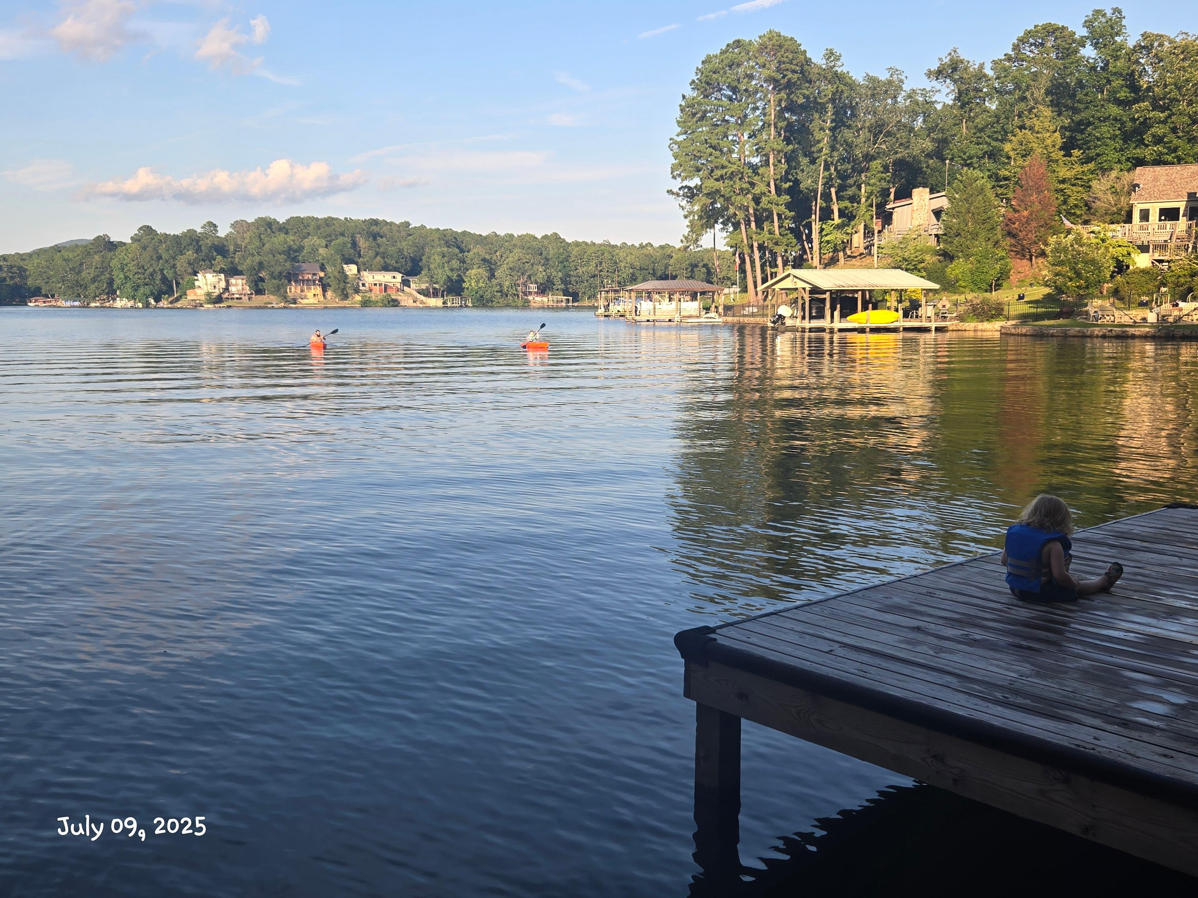 View of portion of dock and cove/lake 