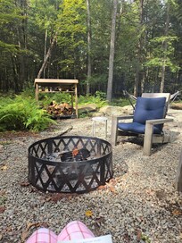 Relaxing by the Owl's Nest's firepit