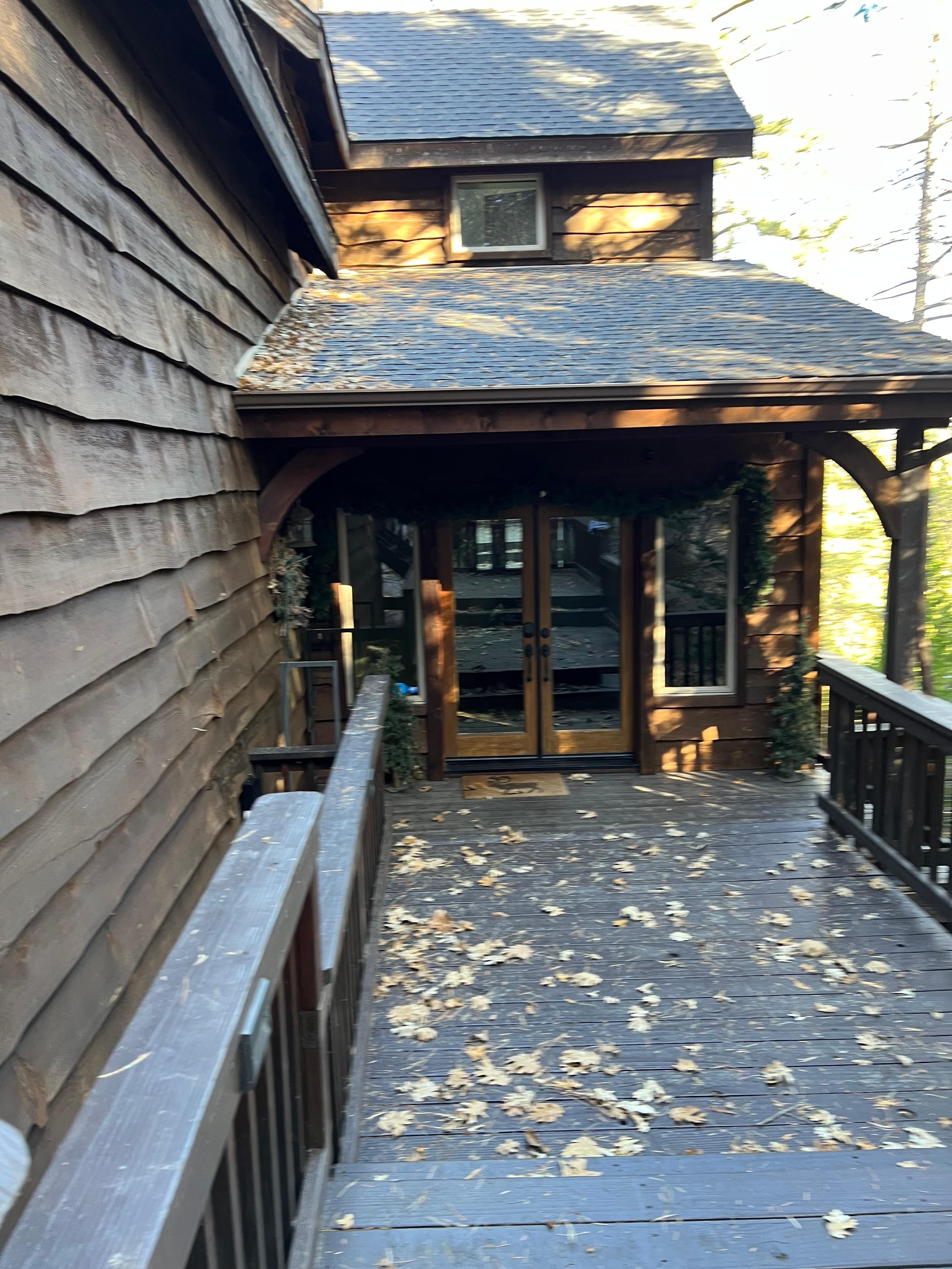 Double doors and large lighted entryway offers a great place for storing jackets and extra gear out of the way. 