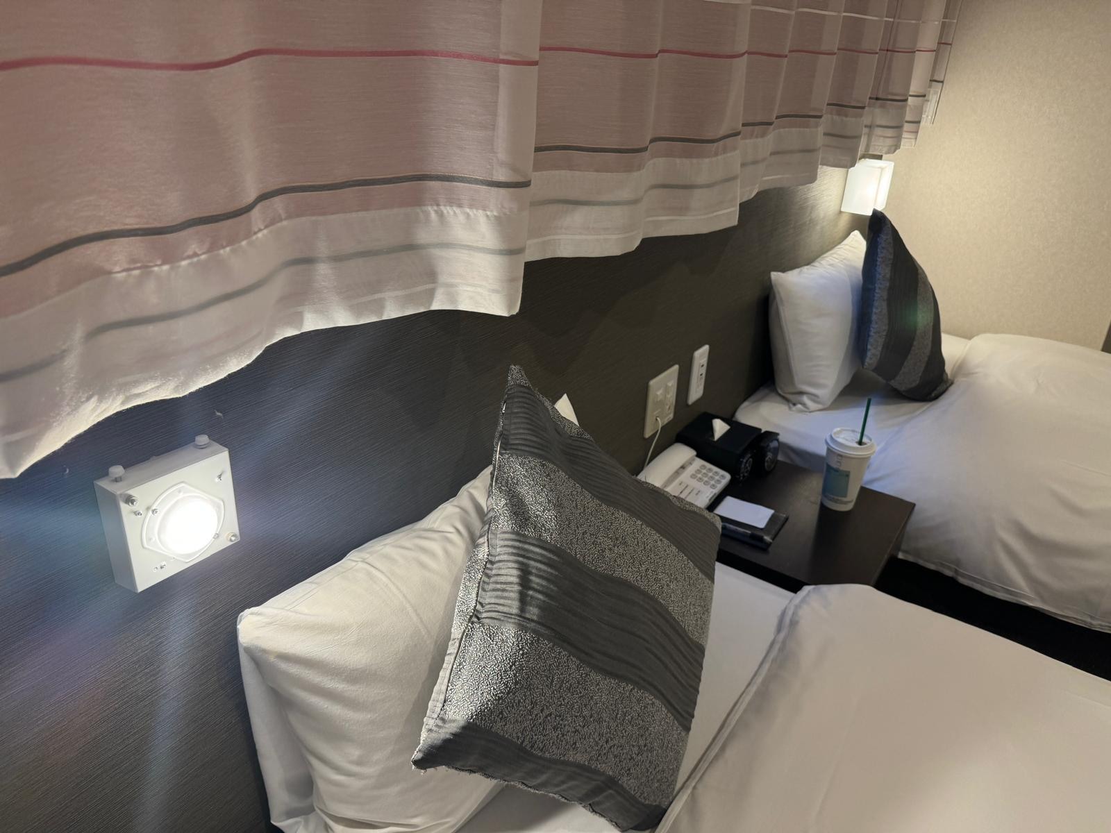 The overhead lamp cover was missing and could be dangerous (upon touching the hot light bulb directly).
