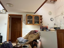 View from the sofa bed, small landing - door ahead bathroom, to the right a twin bedroom