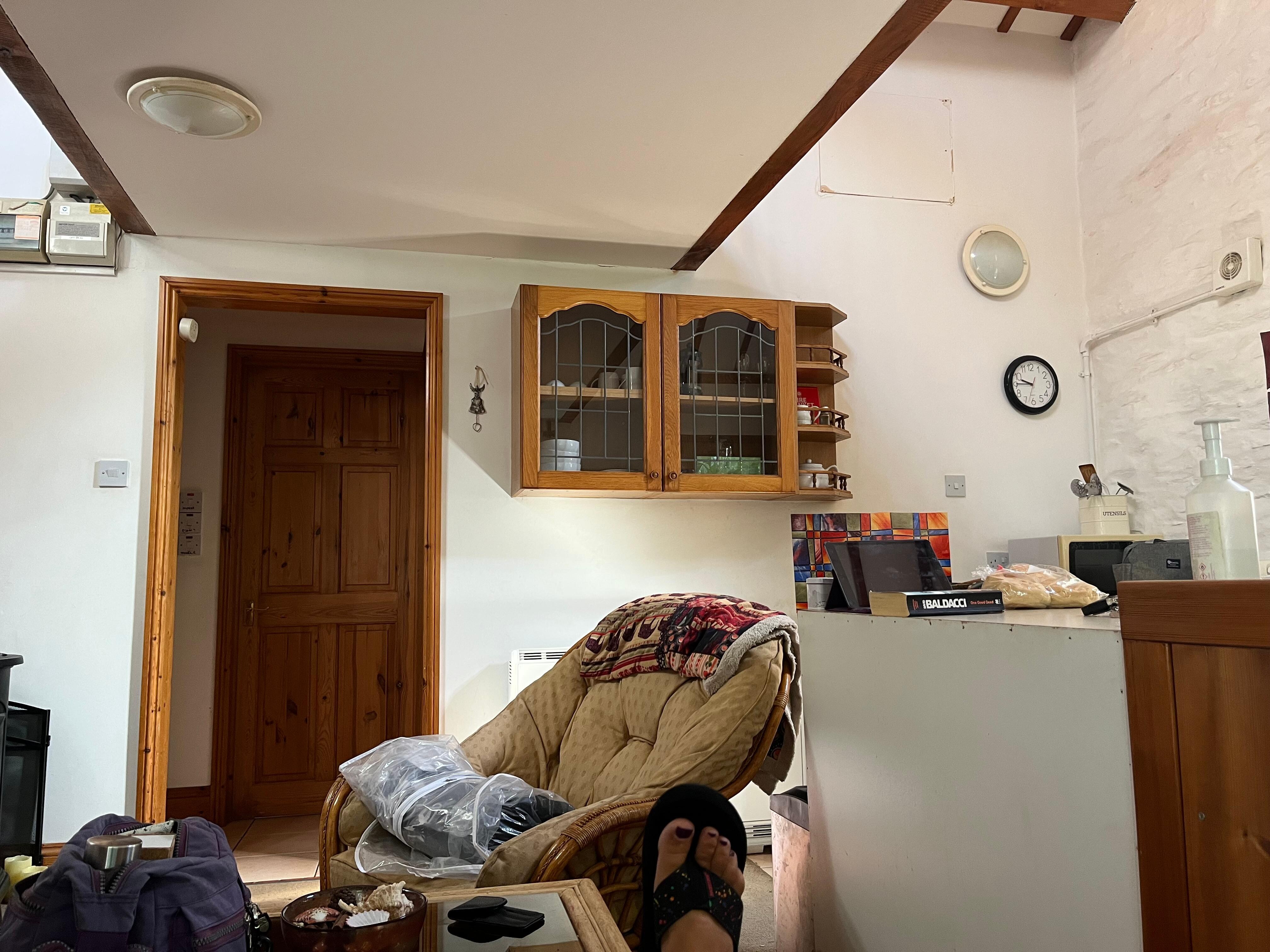 View from the sofa bed, small landing - door ahead bathroom, to the right a twin bedroom