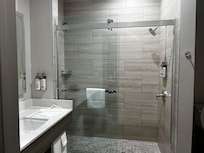 Nice size bathroom with great lighting.