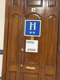 Other business within the shared floor identified as hostal.