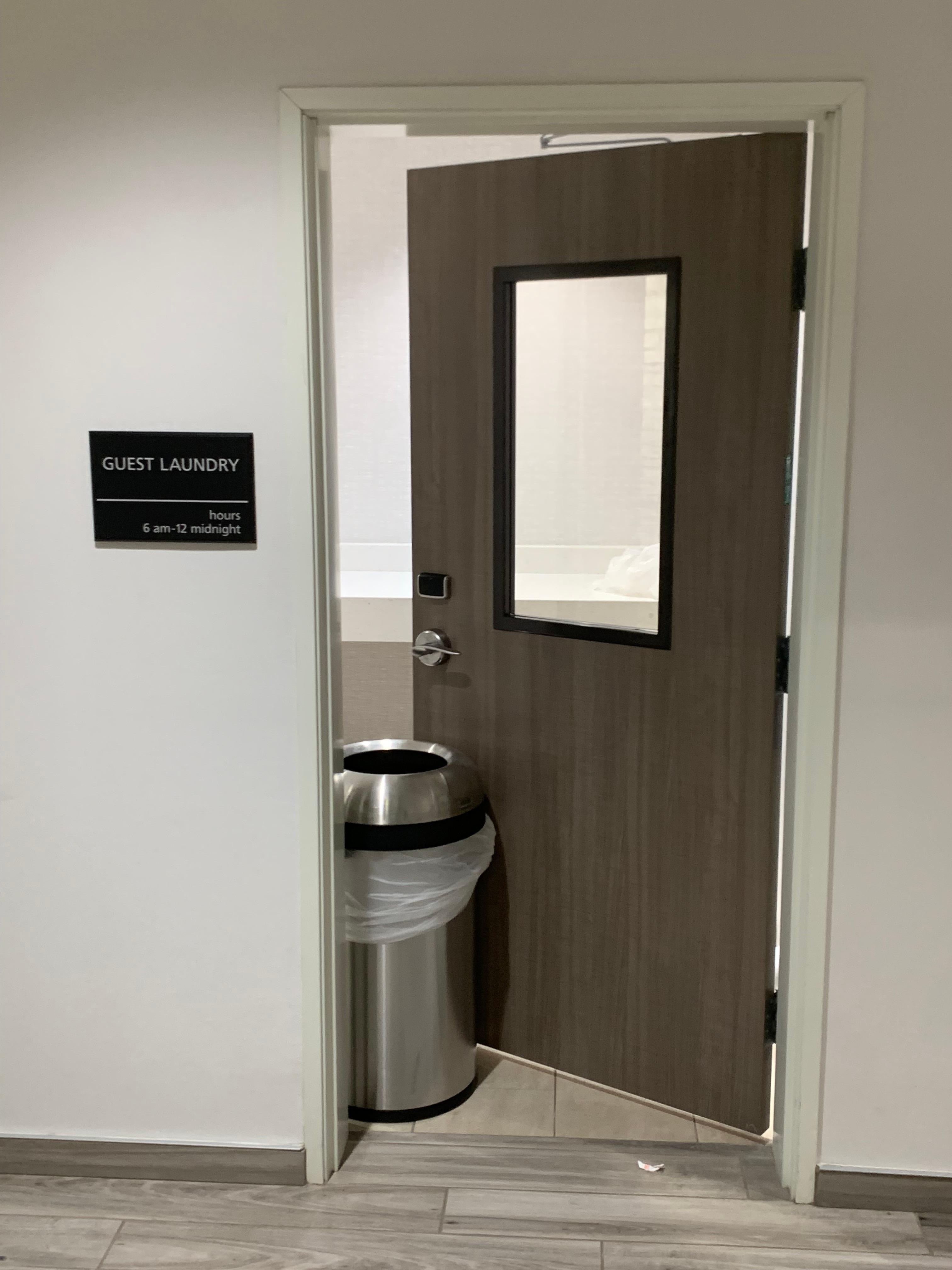 Laundry door had to be propped open due to key cards not working 