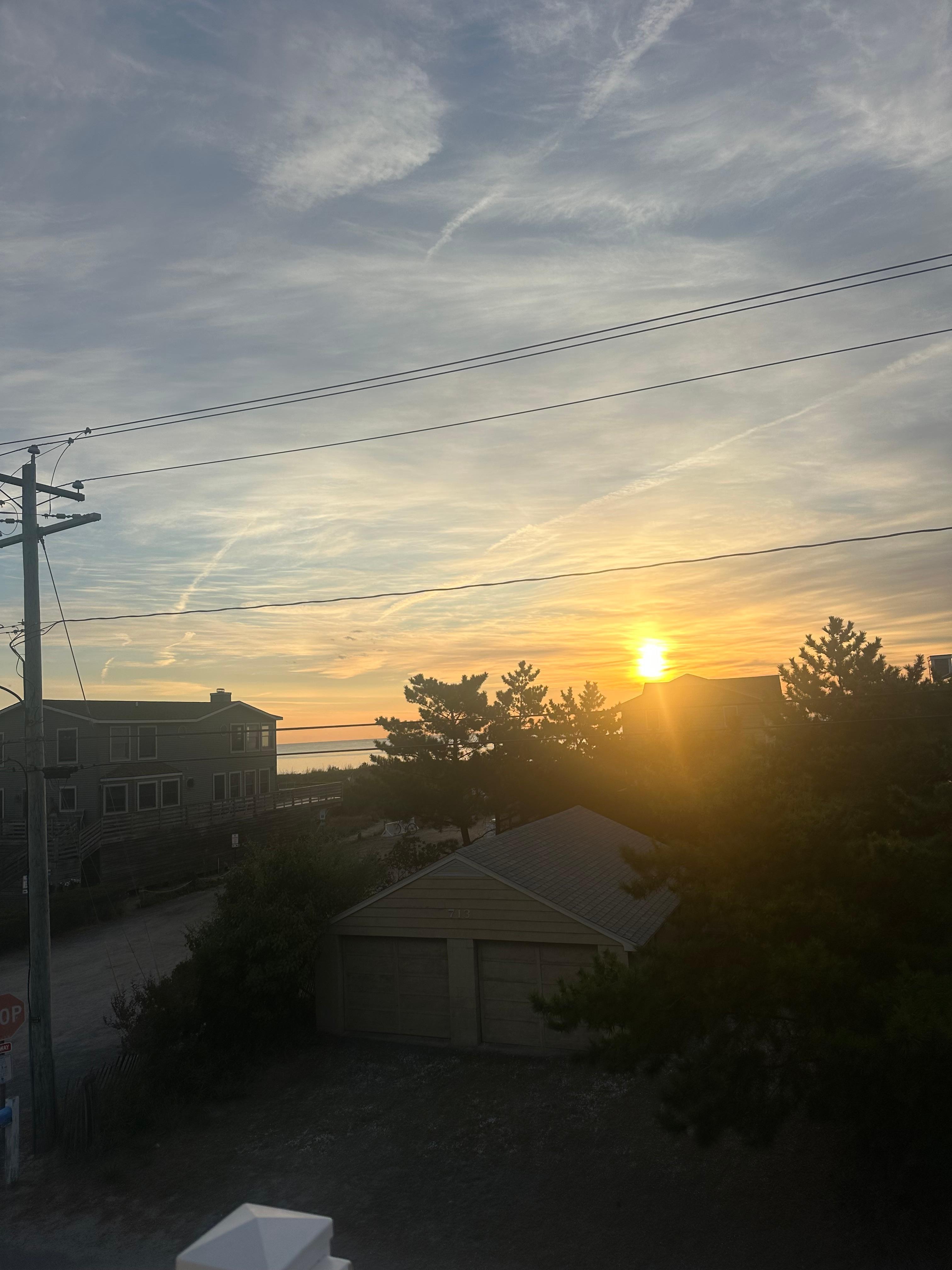 Ocean and sun from top balcony
