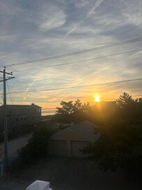 Ocean and sun from top balcony
