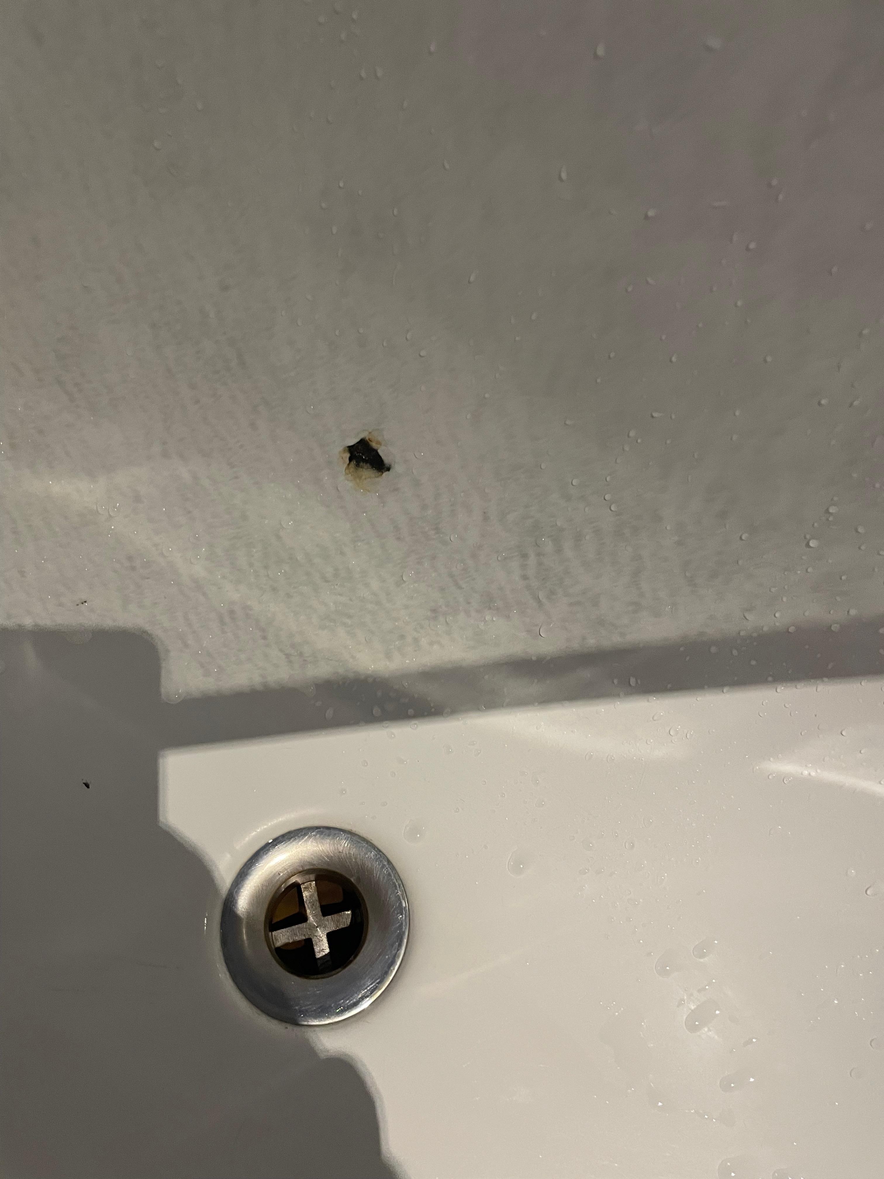 Holes in bath enamel where rust was in the bath