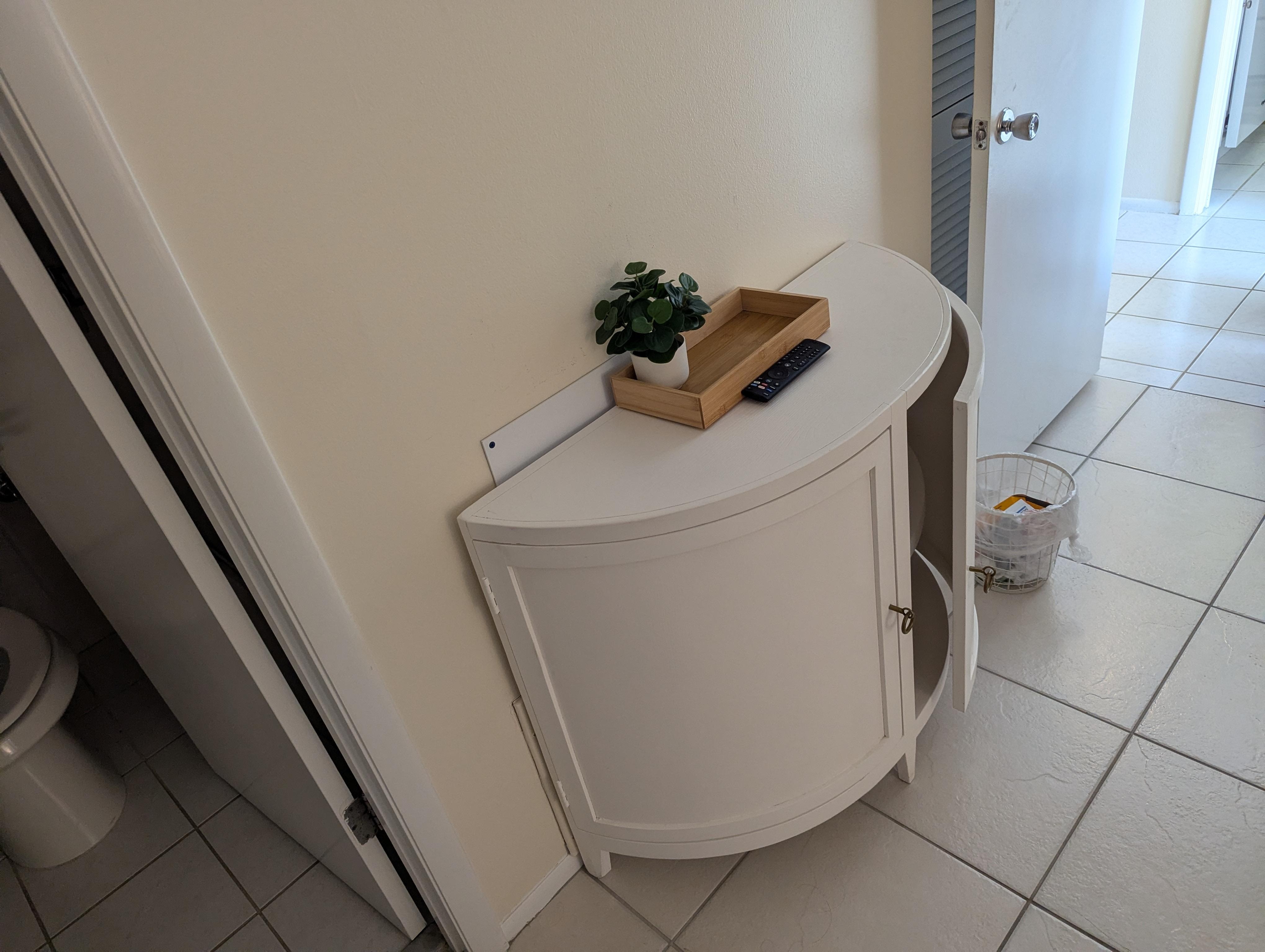 Whatever this cabinet is called it can't close the door. As soon as you do it pops back open