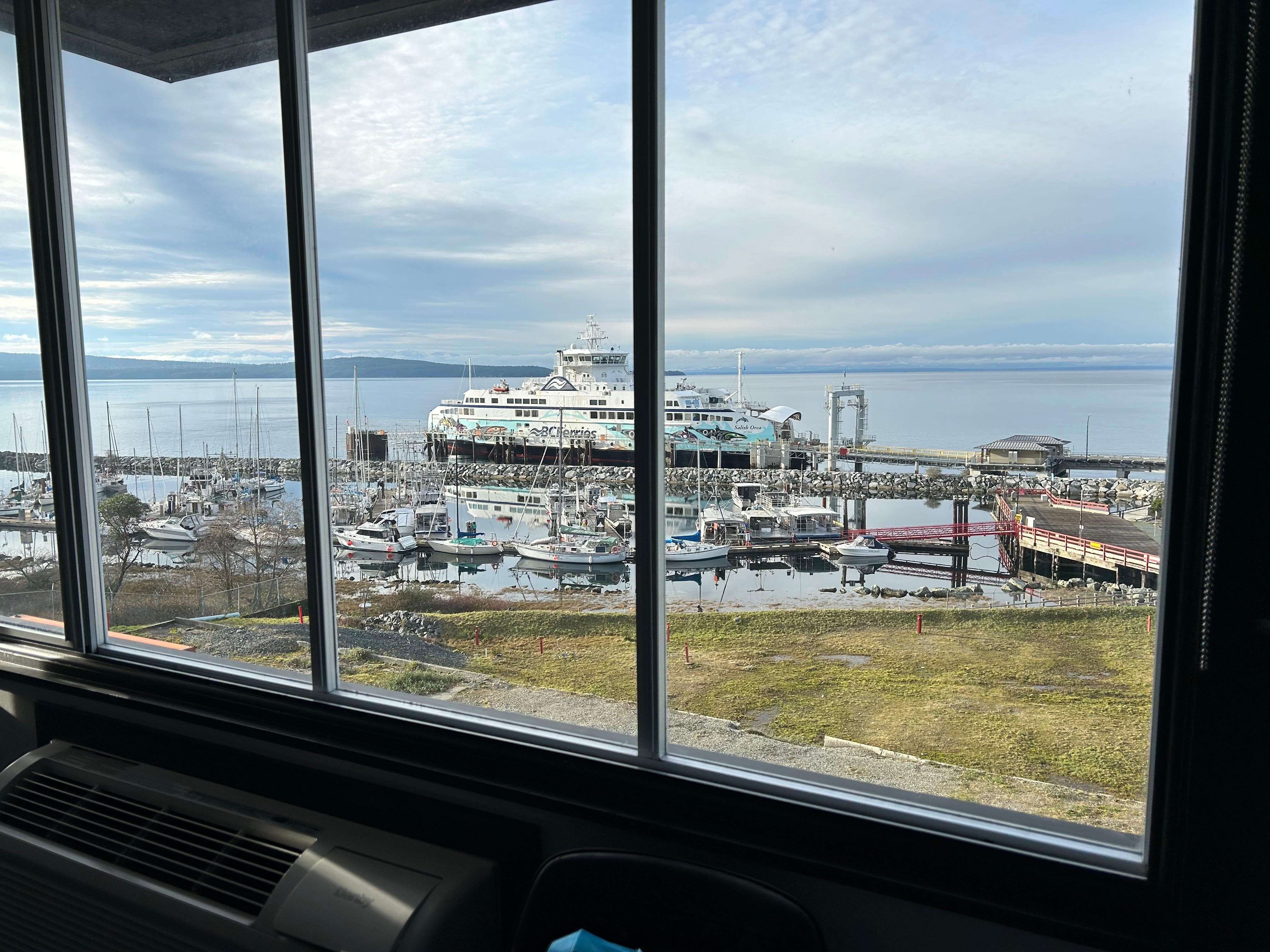 View from king size bedroom. Very quiet and we enjoyed watching the ferry come in.