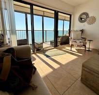 Just a "regular" view of the living room and deck. The beach and the Gulf are always there! Very nice!