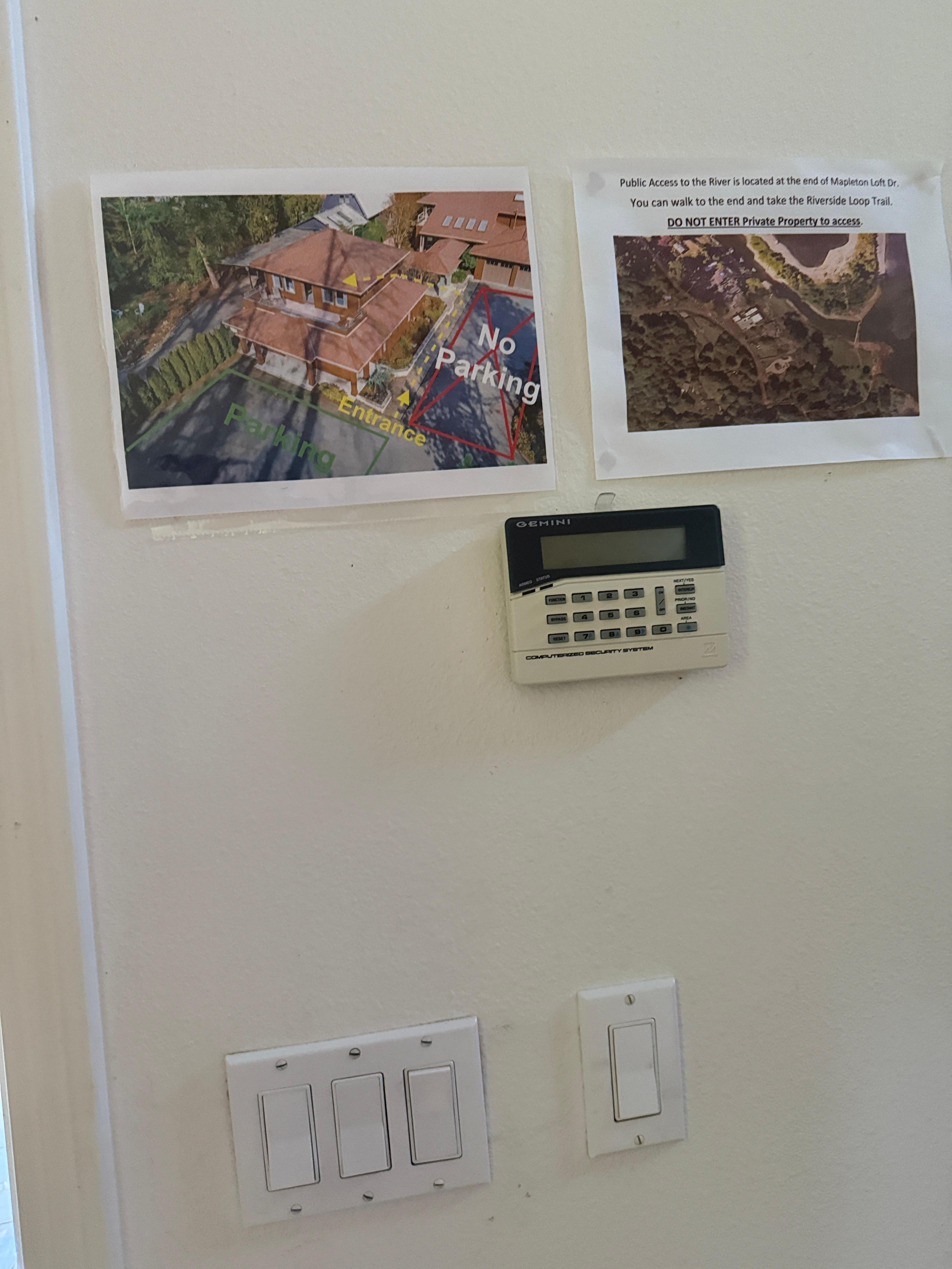 Parking areas outlined were occupied by a charging Tesla and another vehicle. 